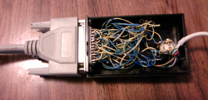 ONE WIRE AT A TIME TO ENCODER ITS UNDER THE BLACK TAPE, TWO WIRES PER KEY, A CRAP LOTTA WIRES. ESC BUTTON ON THE RIGHT.